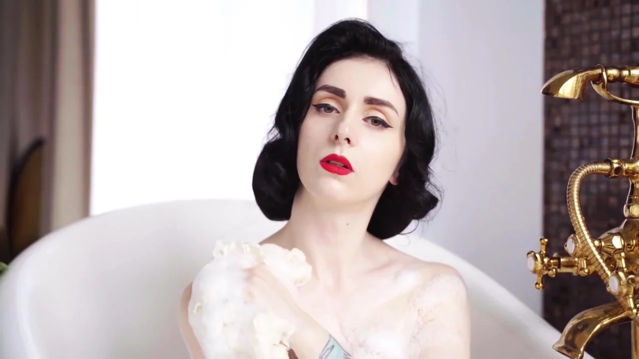 Sexy Brunette Takes A Bubble Bath