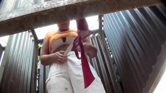 Chubby woman undressing in a cabin