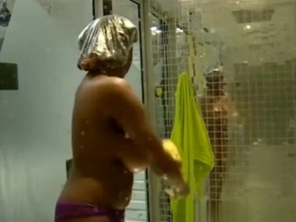 Big tits ebony woman showering