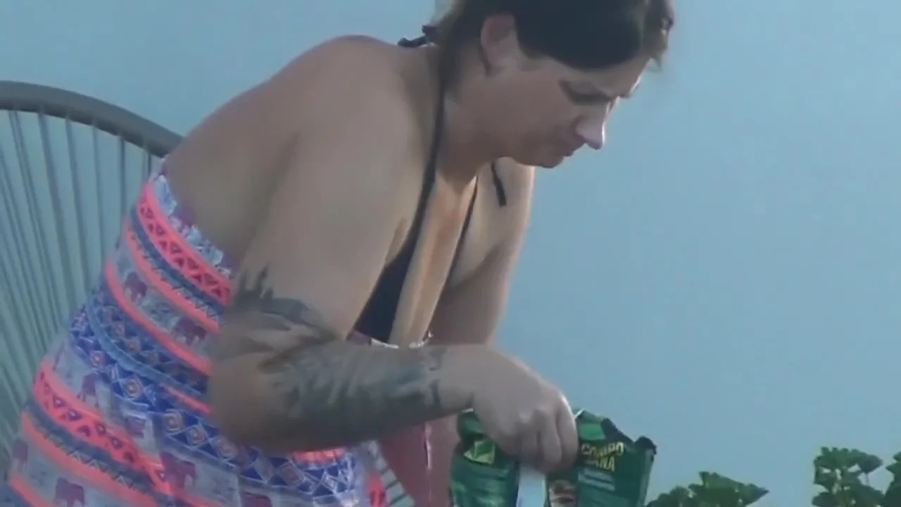 Spy BBW milf work at balcony and take off her clothes