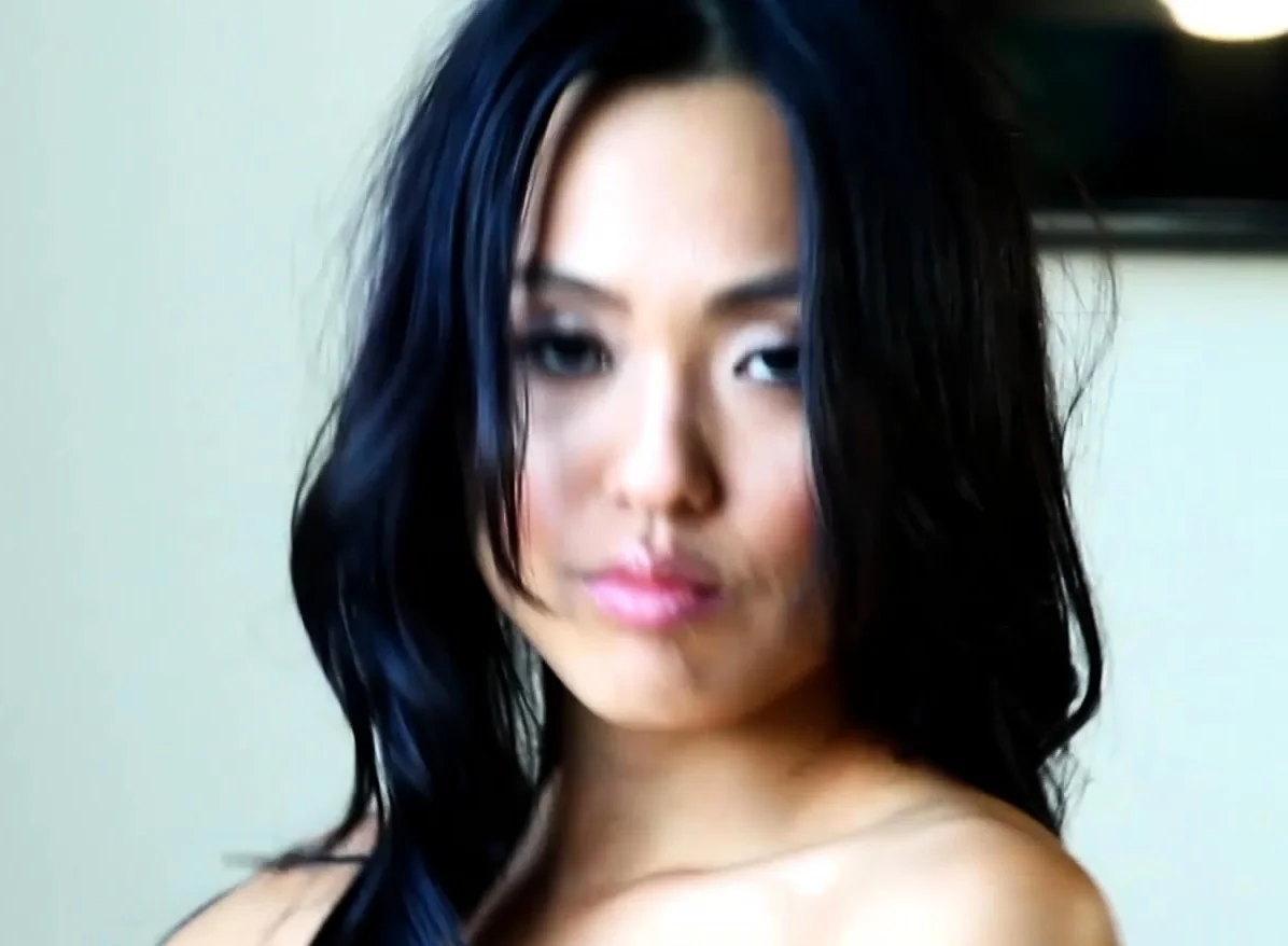 Hot Asian MILF model Kitty Lee striptease for Playboy