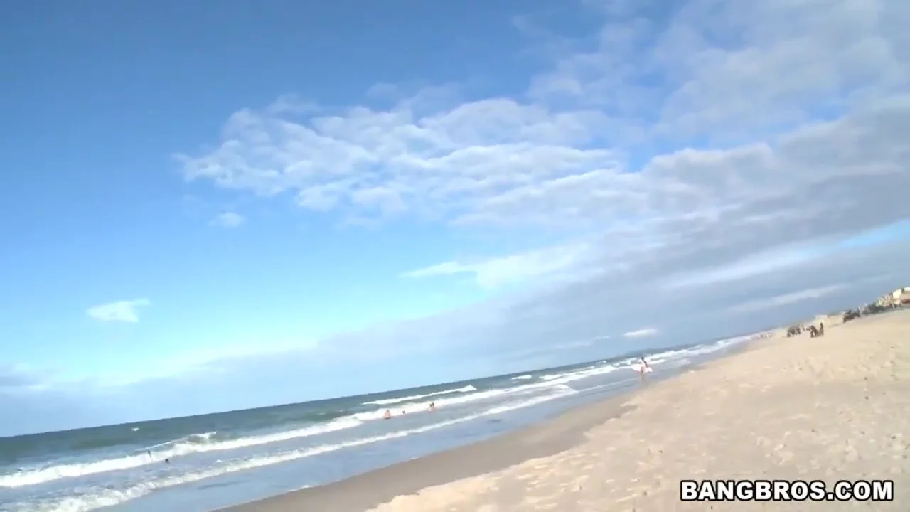 Two horny guys walking along Brazilian beach