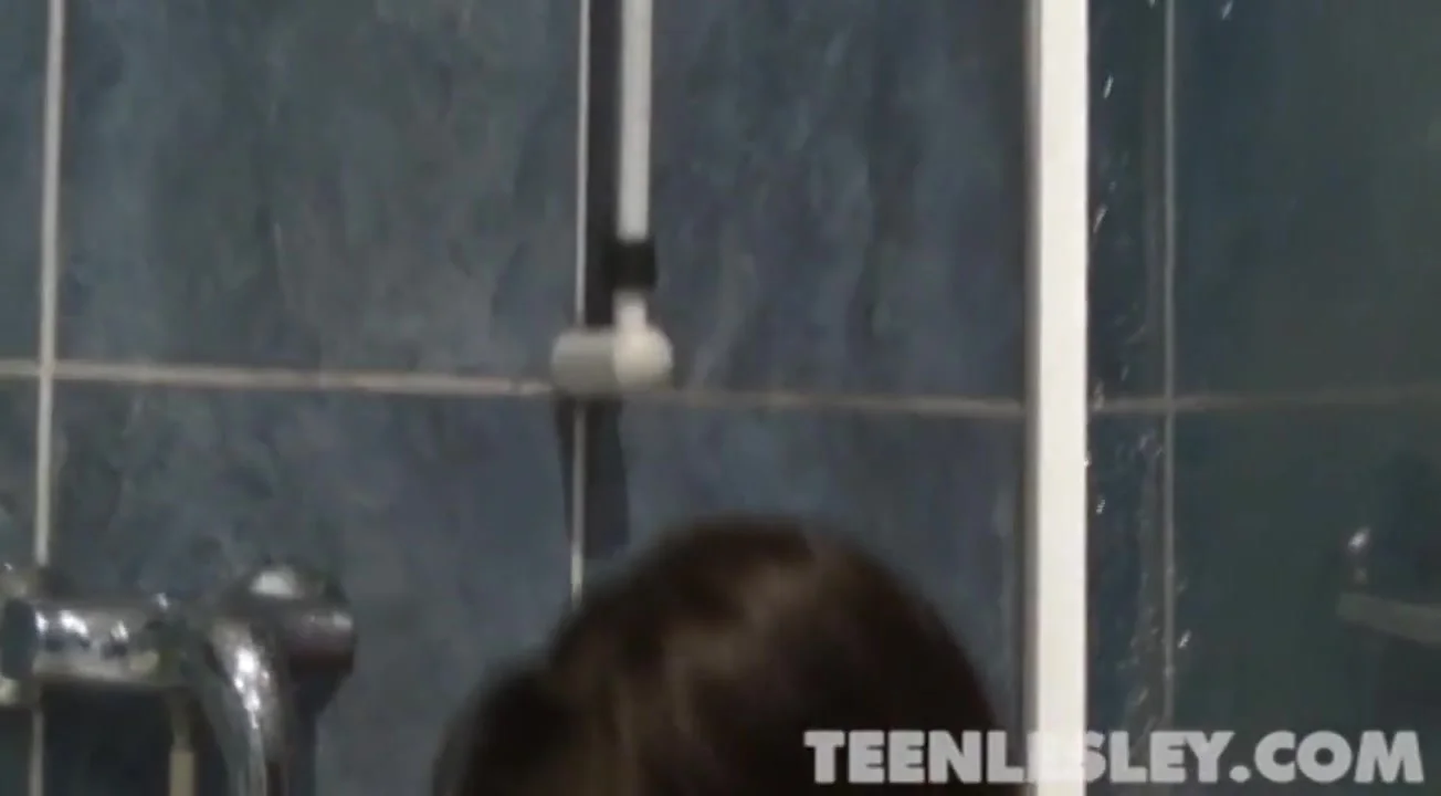 Cute teen masturbates in the hot shower scene
