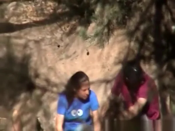 Chick pissing in the nature