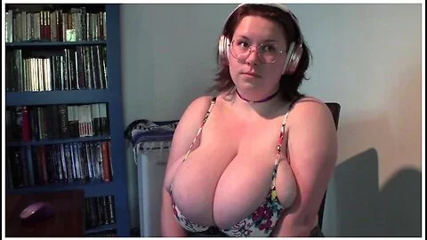 Watching A Vid In Tiny Bra And Blouse