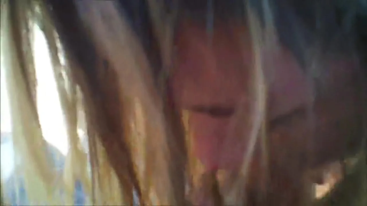 Blonde babe sucking his cock in the back yard