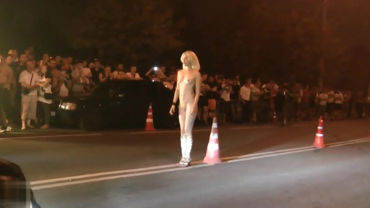 Strip dancing on street