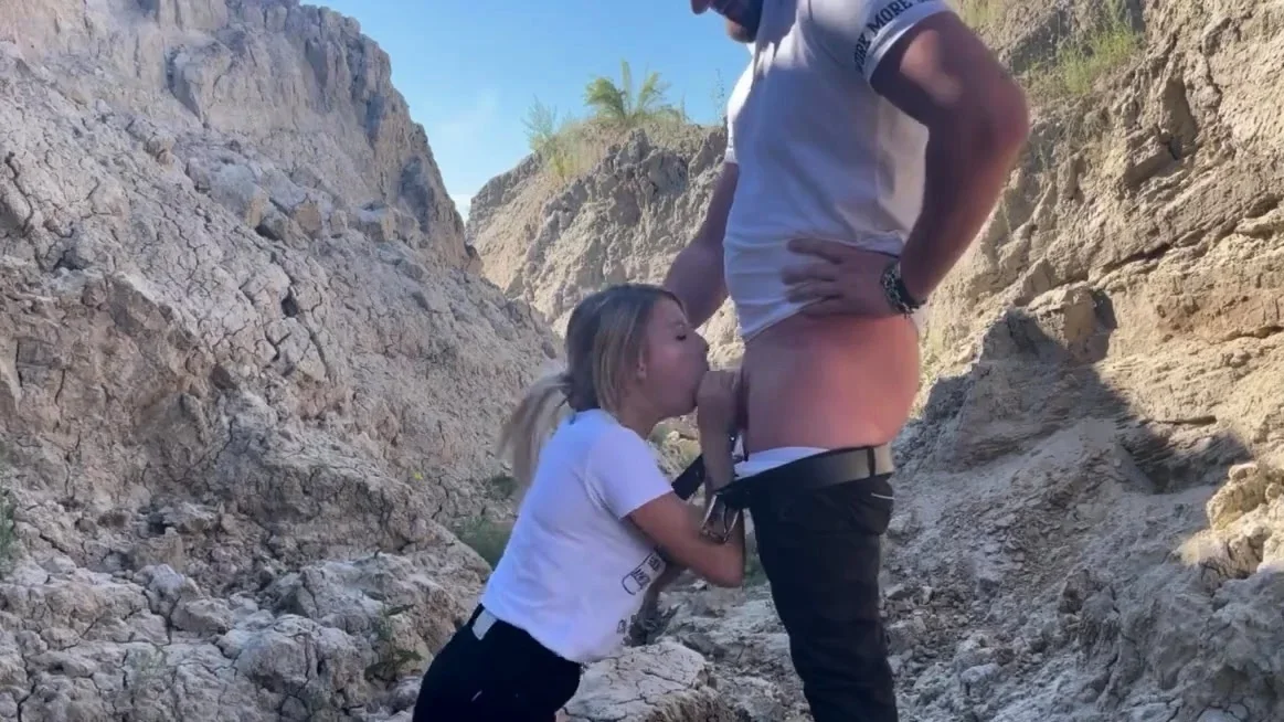 Blonde Babe Sucks a Big Cock Outdoors in a Canyon