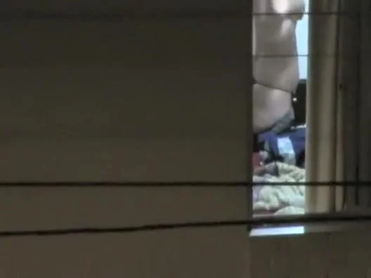 Watching my neighbor's wife undress