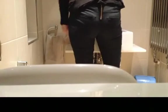 in bathroom spies woman