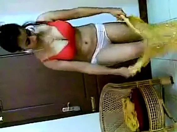 gorgeous Indian girl getting dressed