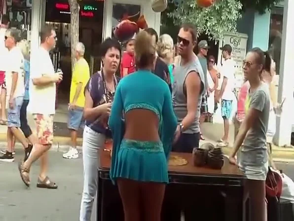 Hot blonde in short blue skirt wind upskirt