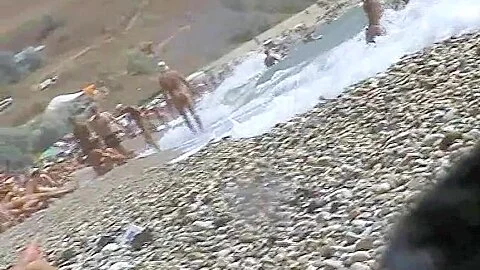 Nudist beach has lots of voyeur's material over here