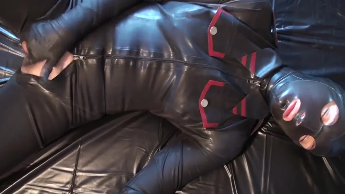 Latex Danielle Masturbating In Army Catsuit With Latex Mask And Gloves