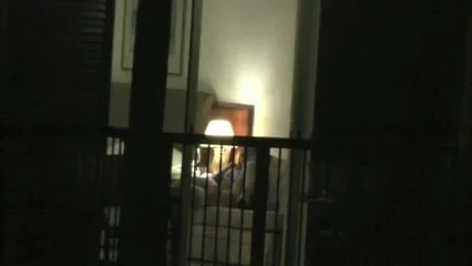 Hotel window II (milf caught playing)