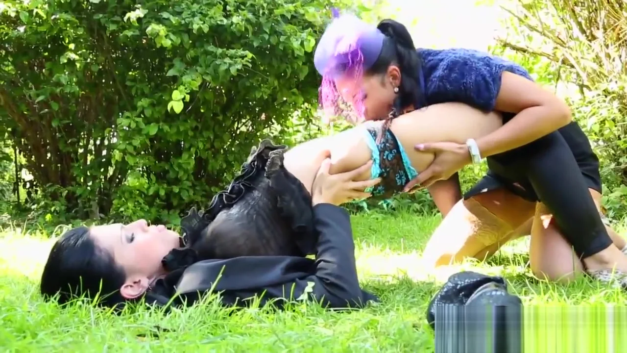 Clothed lesbian pisses ho