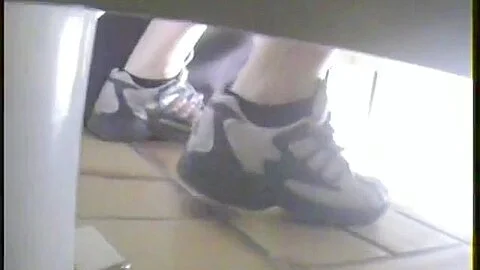 Toilet voyeur video of a hot slim blonde pissing