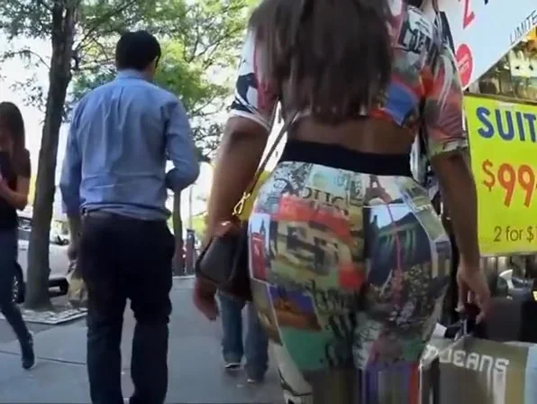 Big ass latin chick wearing tight colorful clothes