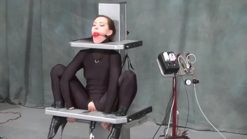 Attractive lady performing in BDSM action