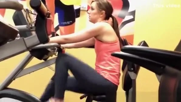 Woman exercising legs in gym