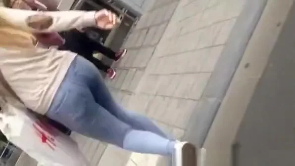 Blonde chick in tight jeans pants