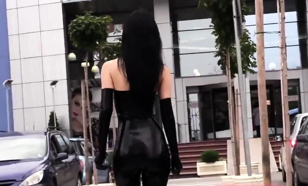 Ultra sexy goth girl wearing black lipstick in public