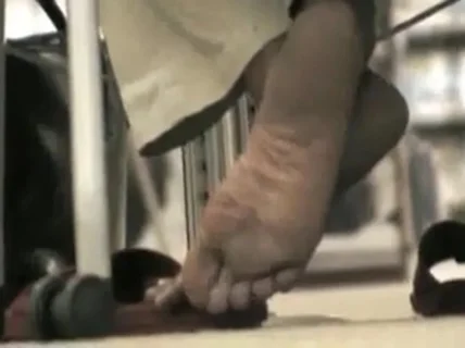 teacher feet in library