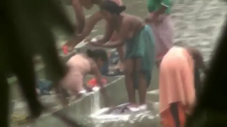 Indian wives wash their breasts