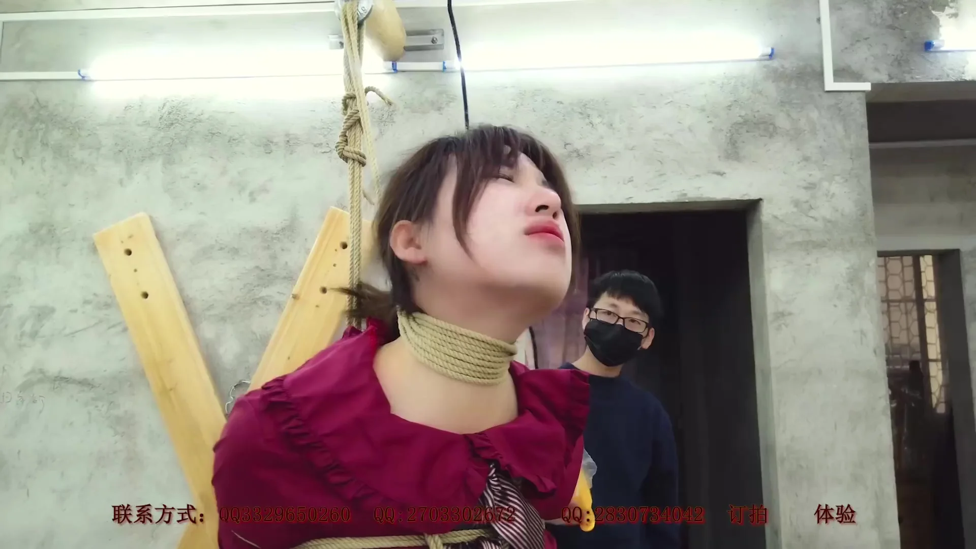 Asian Girl Suspended In Red Dress