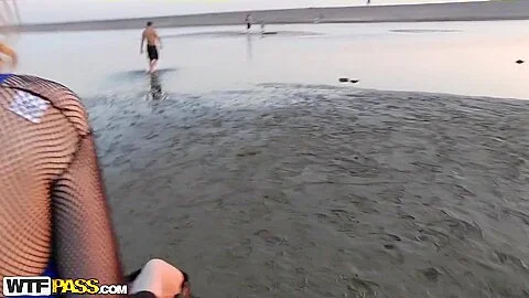 Bitch sucks and fucks while on a public beach