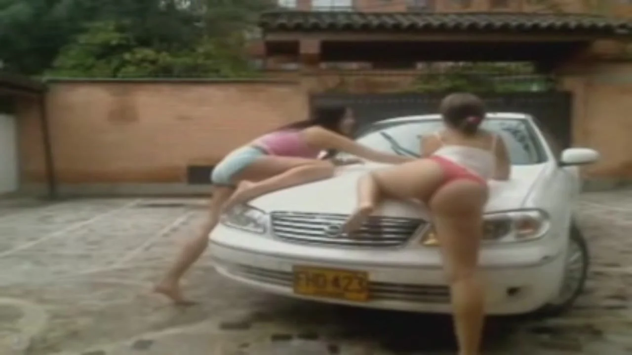 2 latin girls washing the car in the webcam