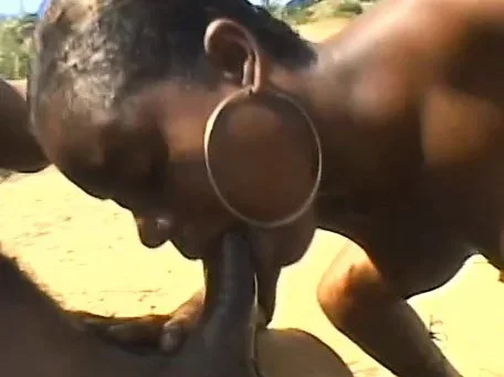 Sweet chocolate babe works her sexy lips on a big black cock outside