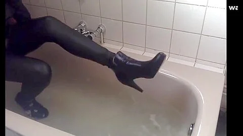 Sexy tight pants ankle boots and heels in bath