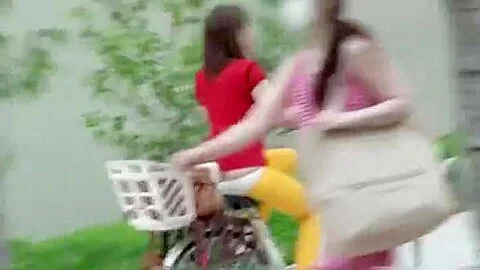 Asian babe with small breasts rides on the bike
