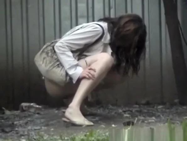 Hot brunette and blonde friend peeing outdoors
