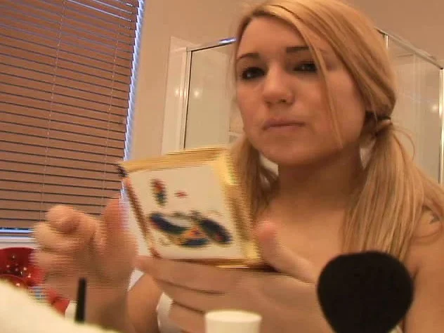 Blonde looker Corri gets prettied up and poses before sucking his dick