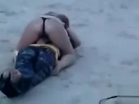 German chick jerks her new friend off at the beach