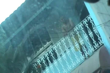 man watching my wife in the car