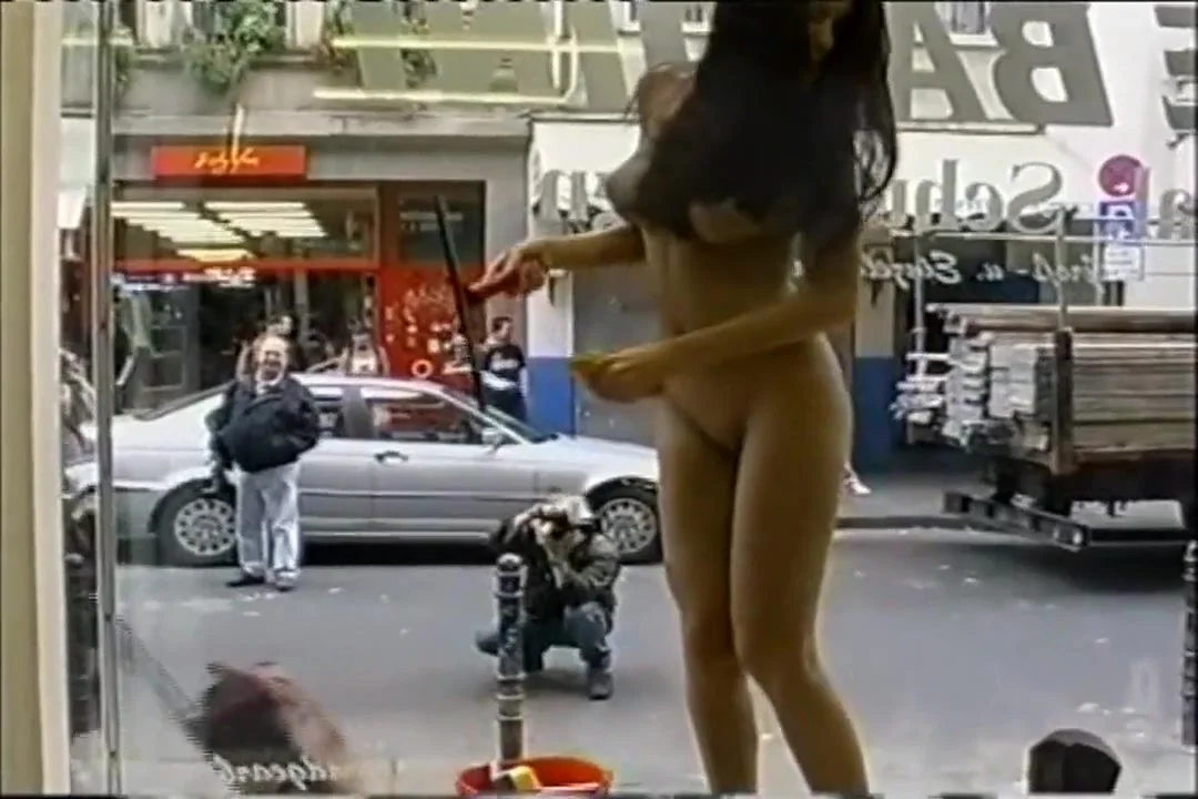 Young flexible looker poses completely naked in the store