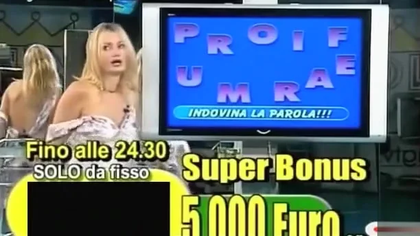 Smoking hot Italian blonde teases with her tits live on TV