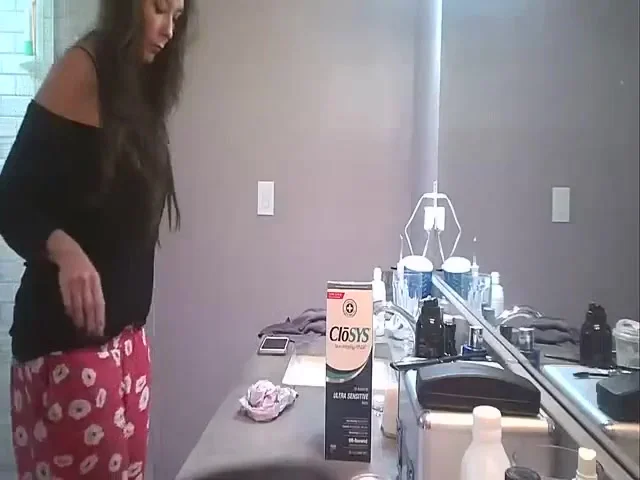 Wife undresses for shower