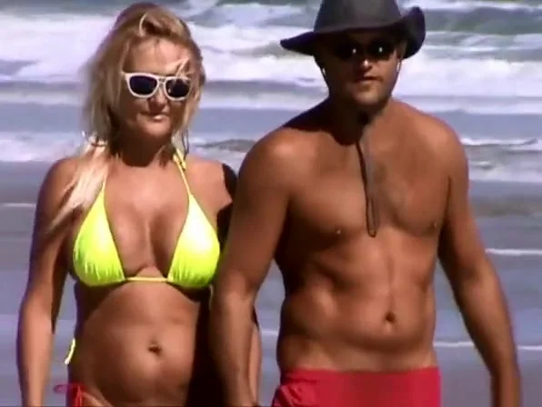 Mature woman in bikini with big tits