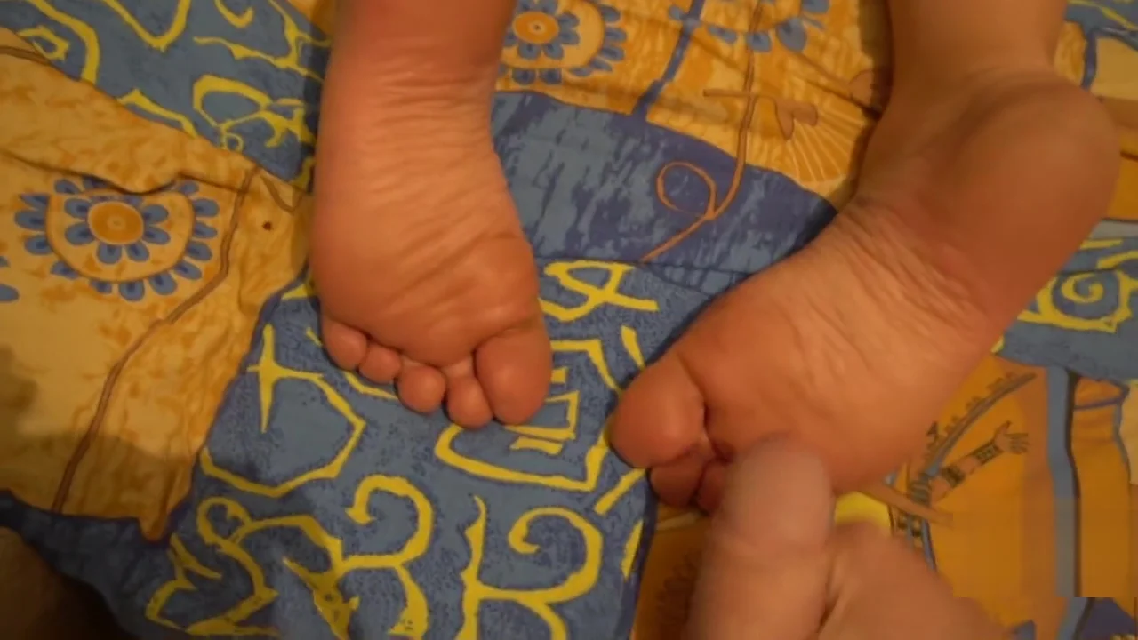 stepson jerks on his Step mother's feet while she and cums on her heels