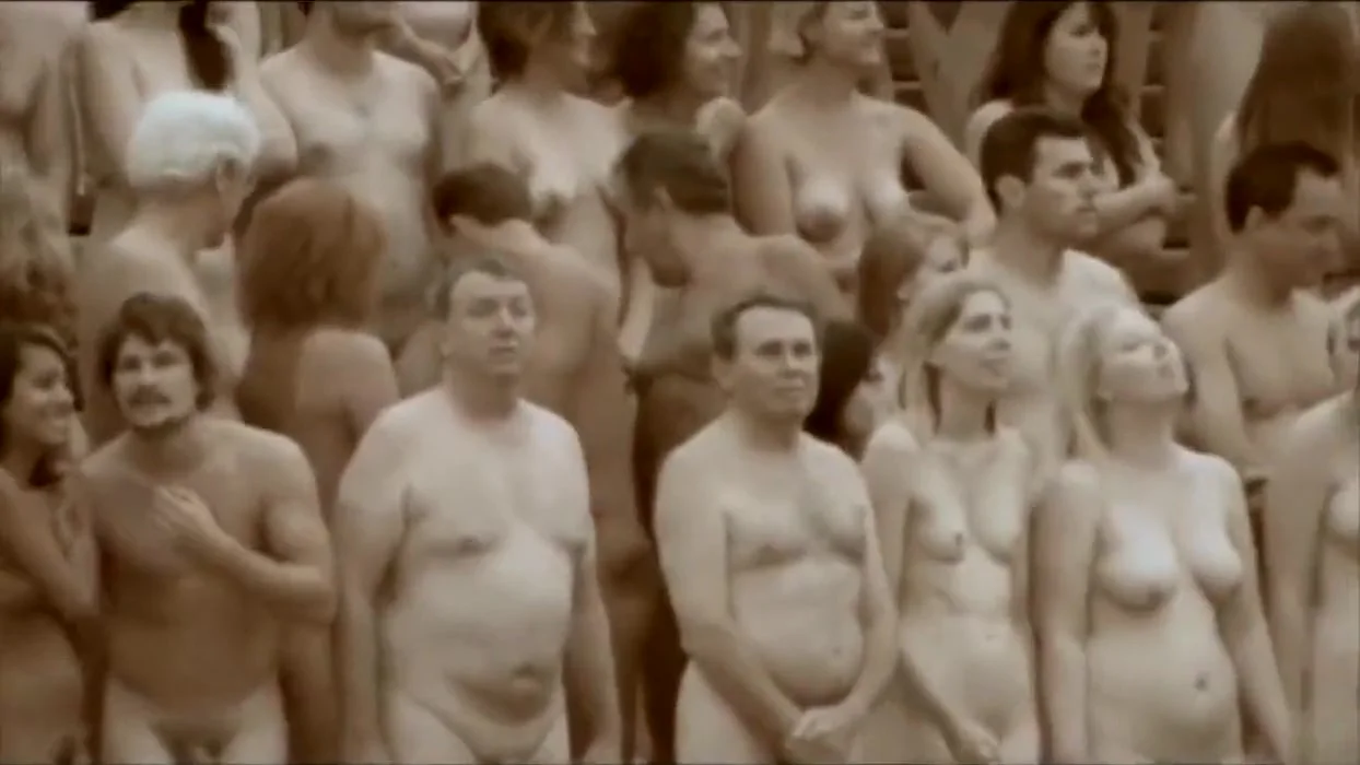 Thousands of people pose completely naked for an art creation