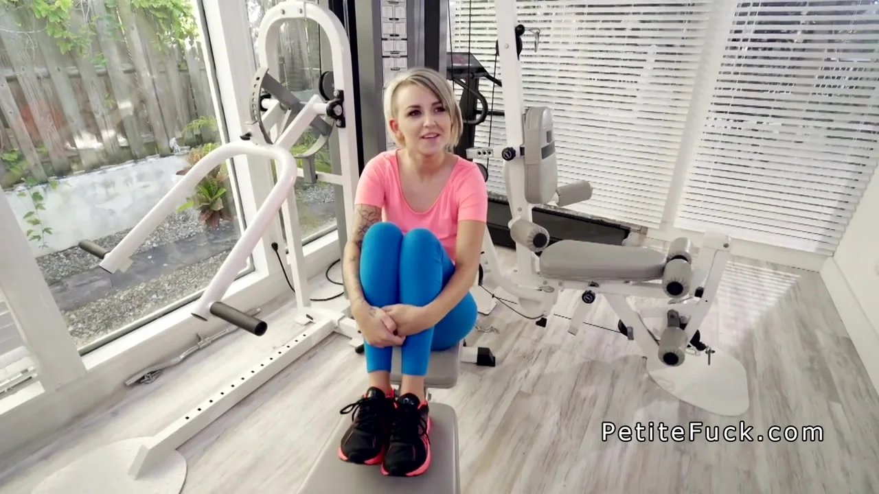 Trainer fucks petite blonde in the gym