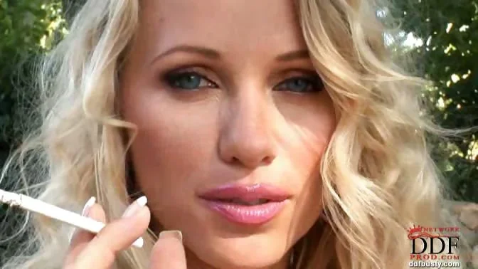 Sexy blonde babe Nikita Valentin went outdoors to show her hot body with her firm ass, pussy, and her huge natural boobs! This horny babe loves stripteasing, so she is doing her very best to make men hard... Do you think she is managing...? 