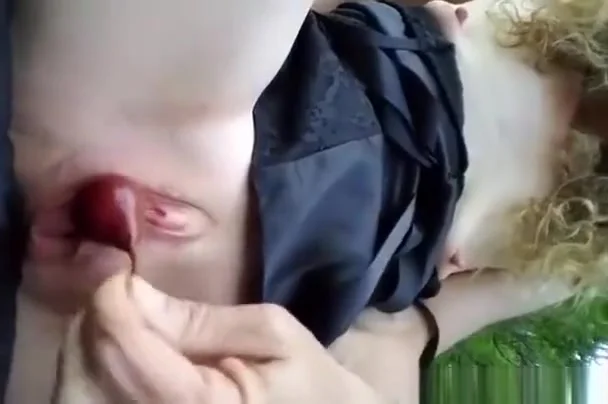 Shaved Girl Is Outdoors Playing With Herself