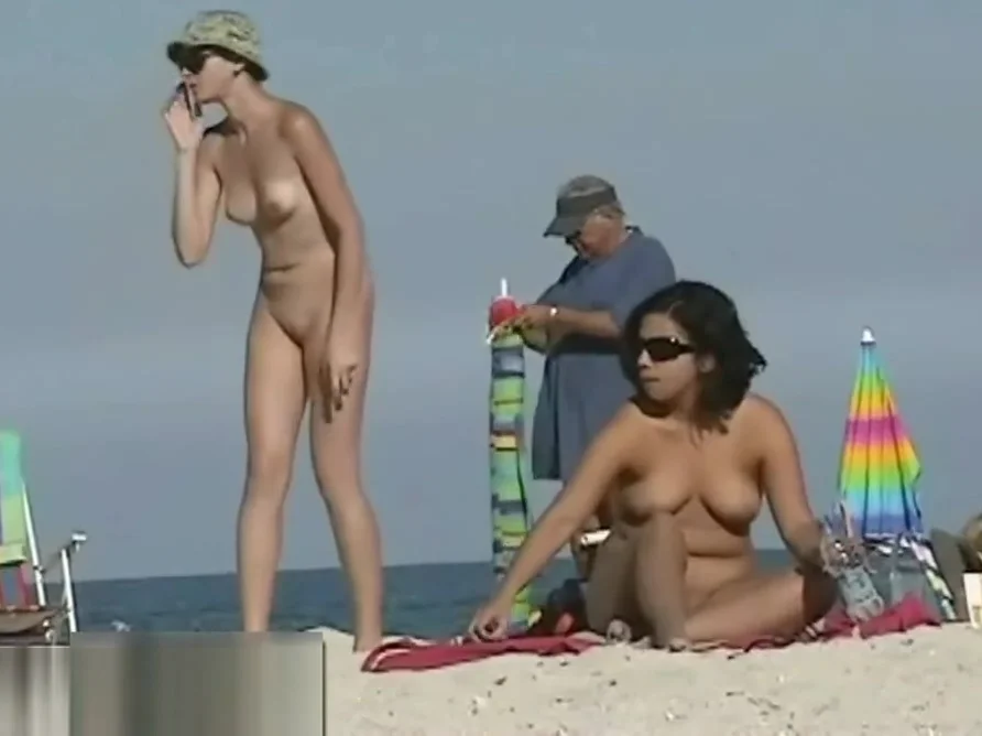 Stunning tanned babes are all over that nudist beach
