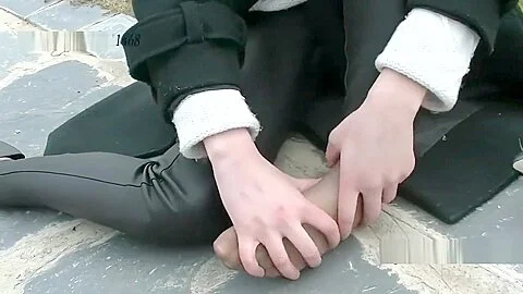 Chinese girl sprains foot in high heel and nylon