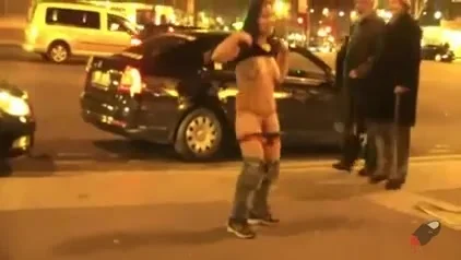 girl stripping in public in front of crowd